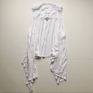 White flowy vest with lace detail. Size small
